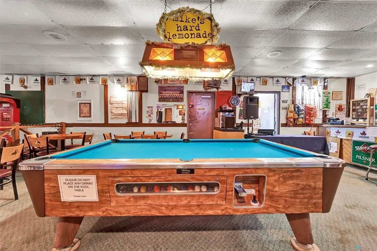 Full-sized pool table in the Clavet Bar